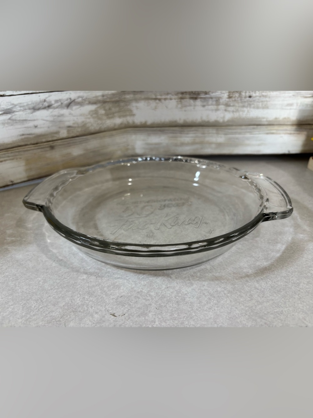 Vintage 90s glass pie plate commemorating Fire-King’s 50th anniversary.